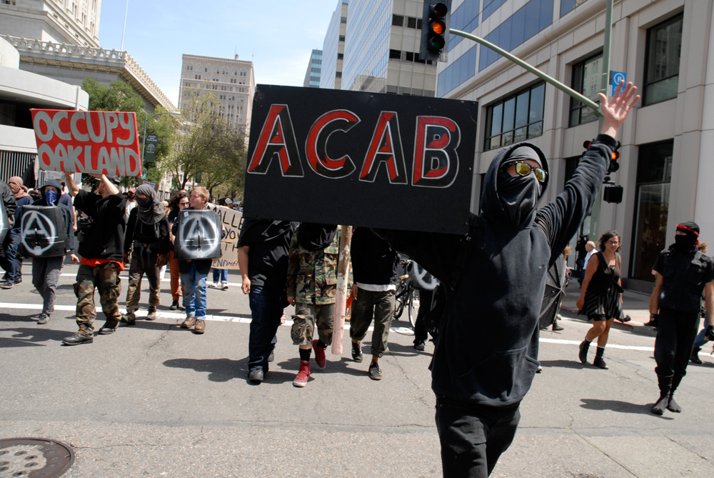 Radical gay anarchist group denies billboard destruction